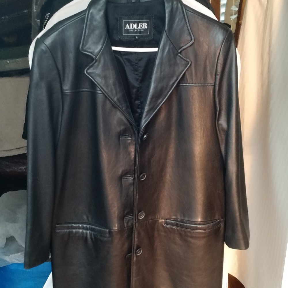 Genuine Lamb Skin leather coat.  Never worn!
